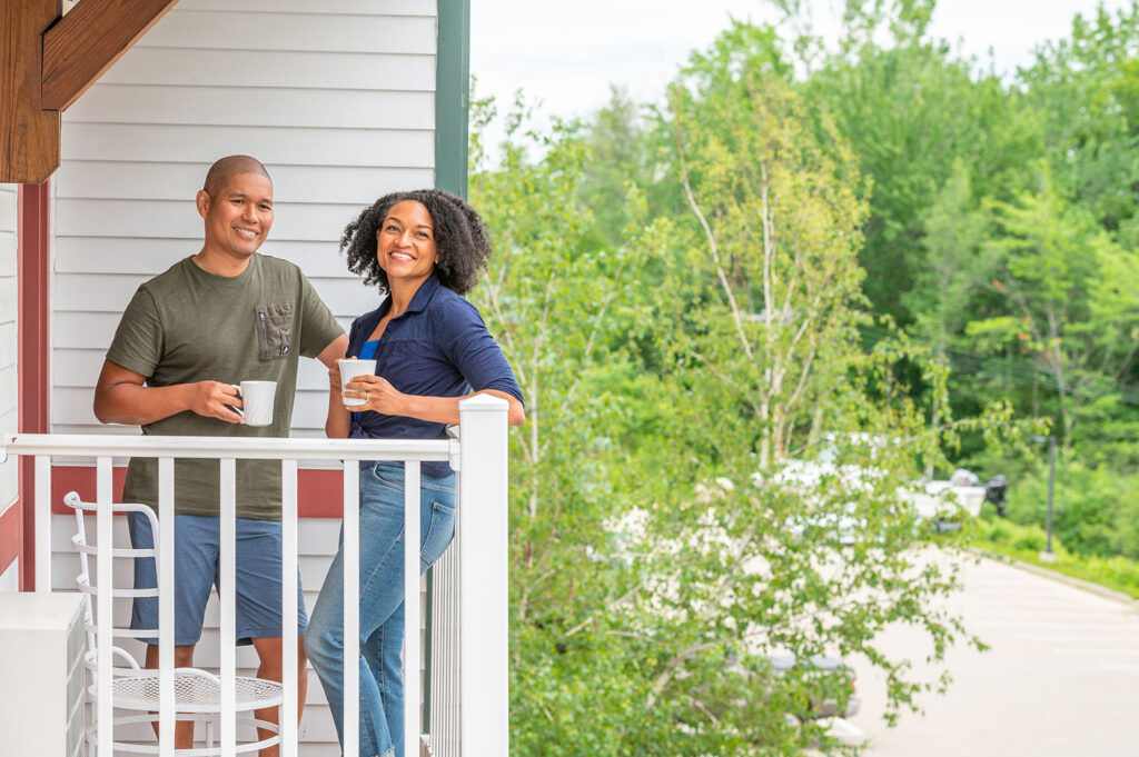 Couple on balcony of eastern slope inn